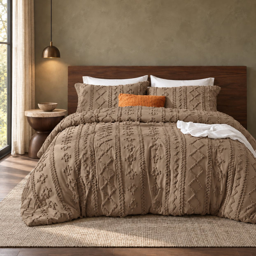 Brown tufted comforter set on a bed