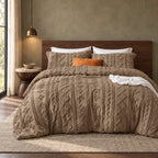 Brown tufted comforter set on a bed