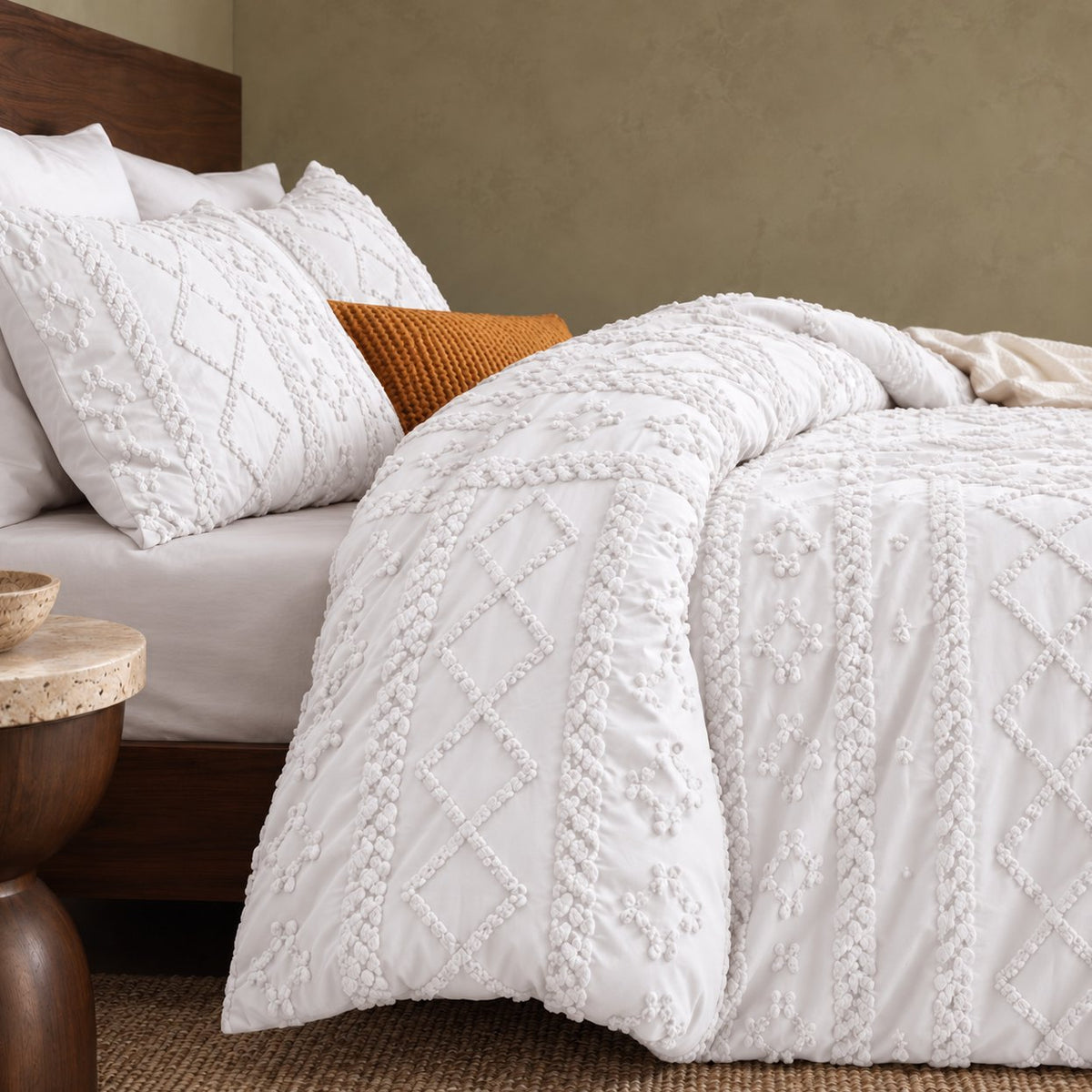 Tufted comforter detail, White